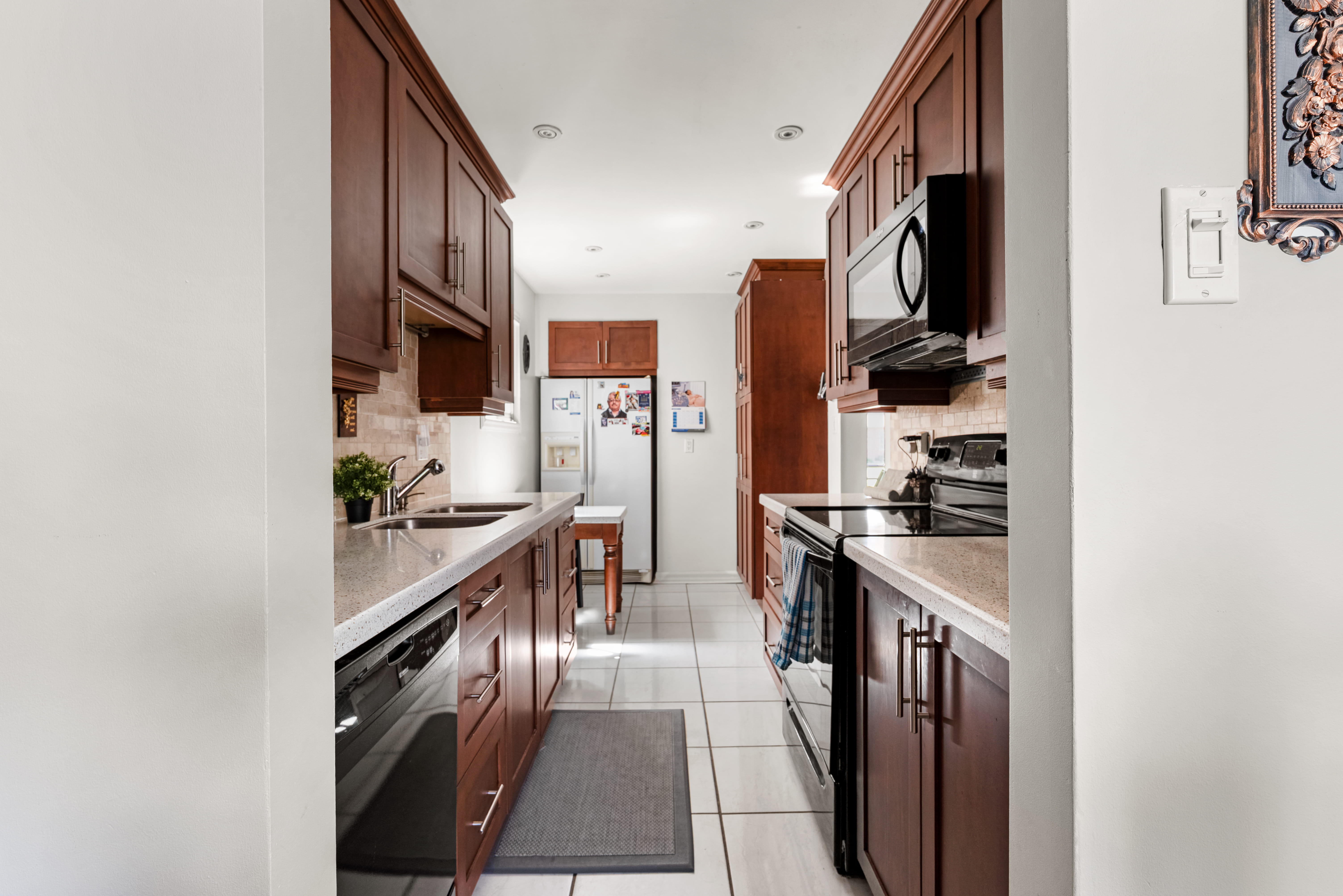 Modern kitchen with clean lines and quartz countertops